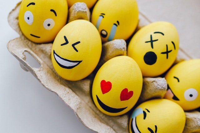 Eggs painted in emoticons